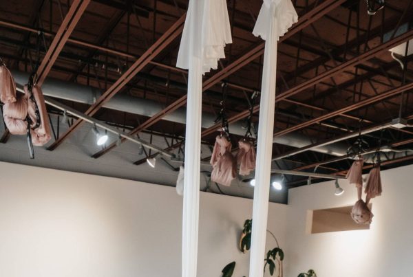 aerial yoga class student