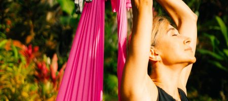 The Well-Being Benefits of Aerial Yoga You’ll Feel From Day One